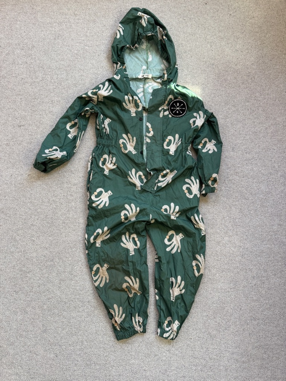 Bobo Choses Green Hooded One-Piece with Cream Handprint Print